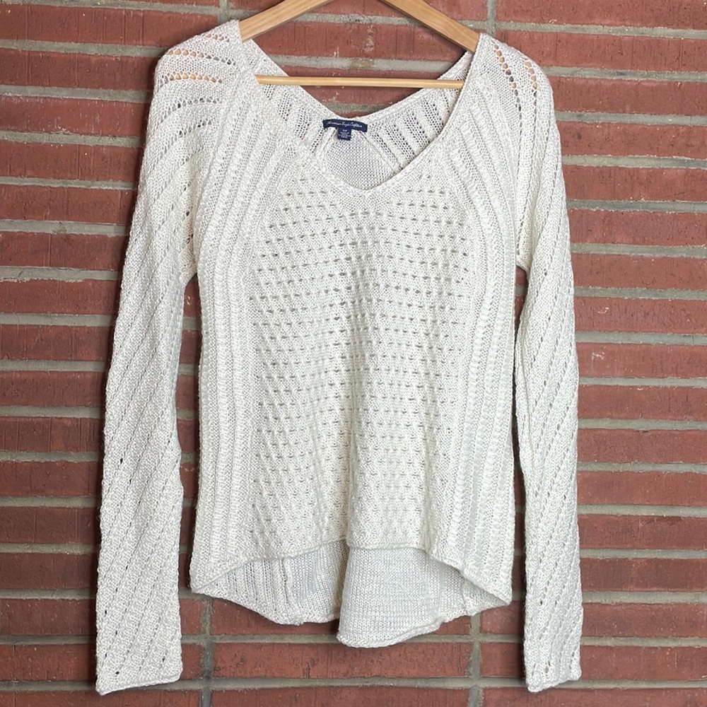 American Eagle cream v neck sweater with silver thread and eyelets- size small